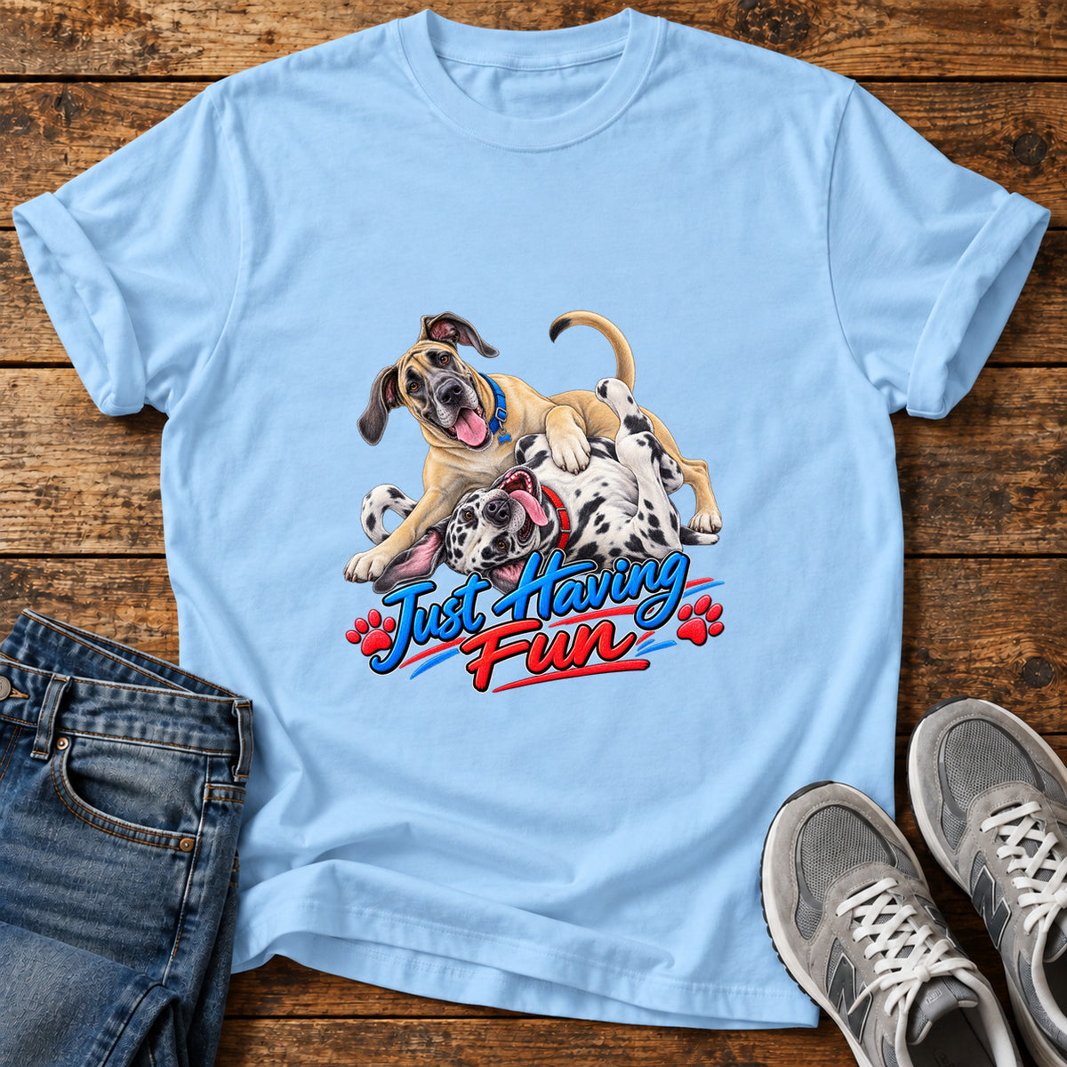 Just Having Fun Great Dane graphic T-shirt in Light Blue, shown on a flat-lay shirt mockup