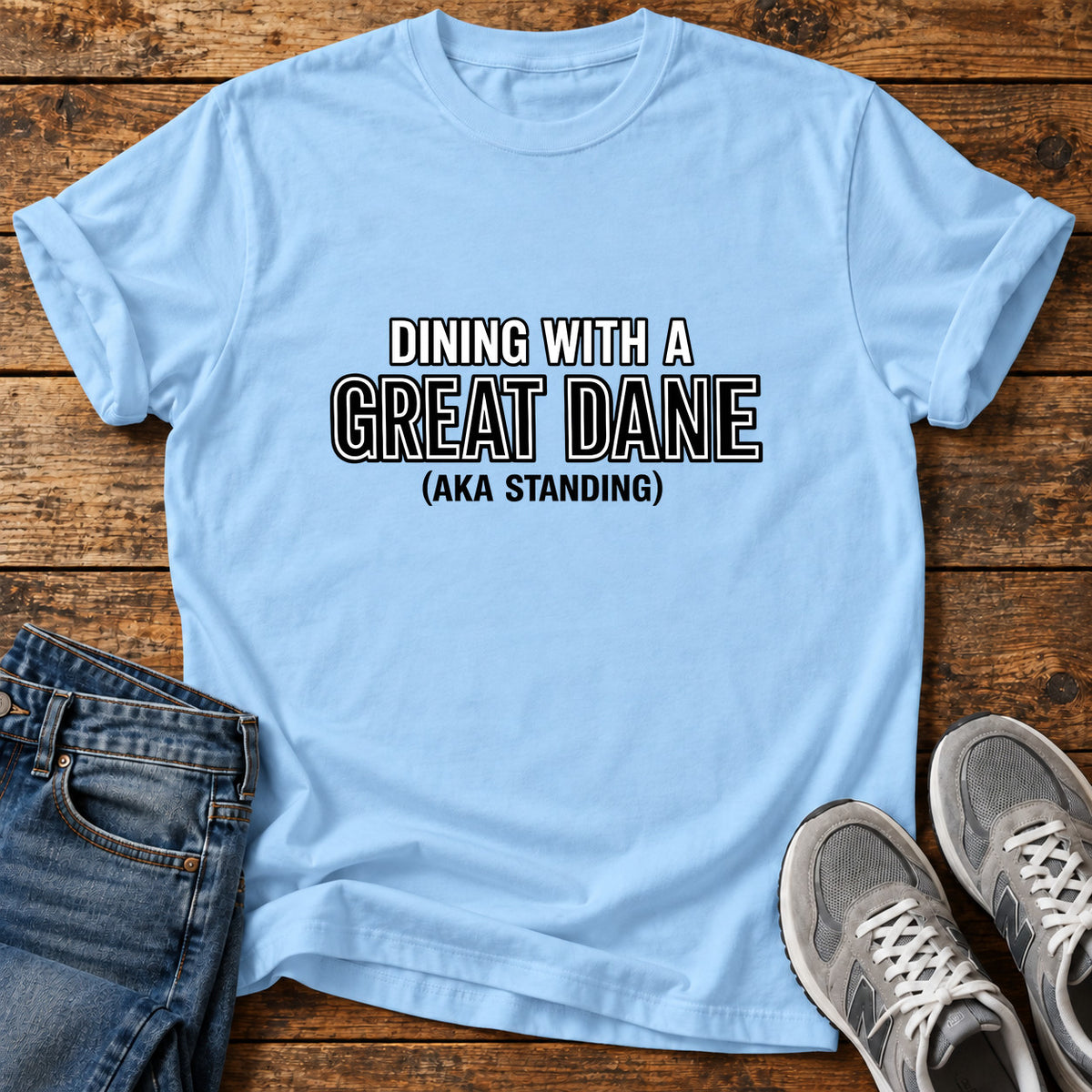 Dining With Dane Great Dane graphic T-shirt in Light Blue, shown on a flat-lay shirt mockup