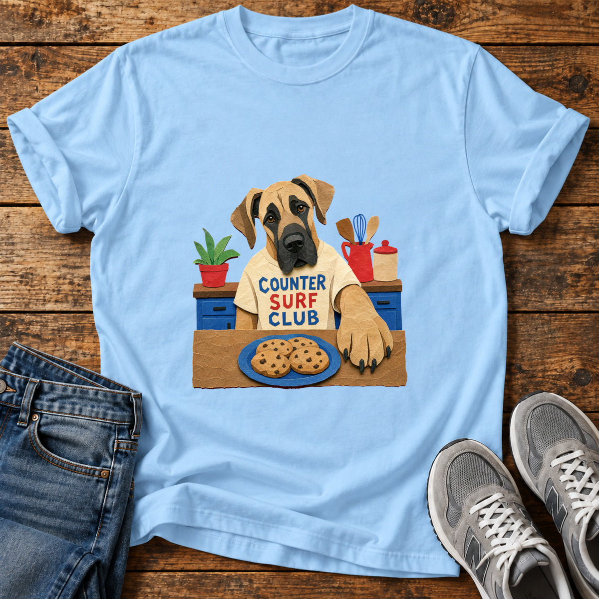 Counter Surf Club Great Dane graphic T-shirt in Light Blue, shown on a flat-lay shirt mockup