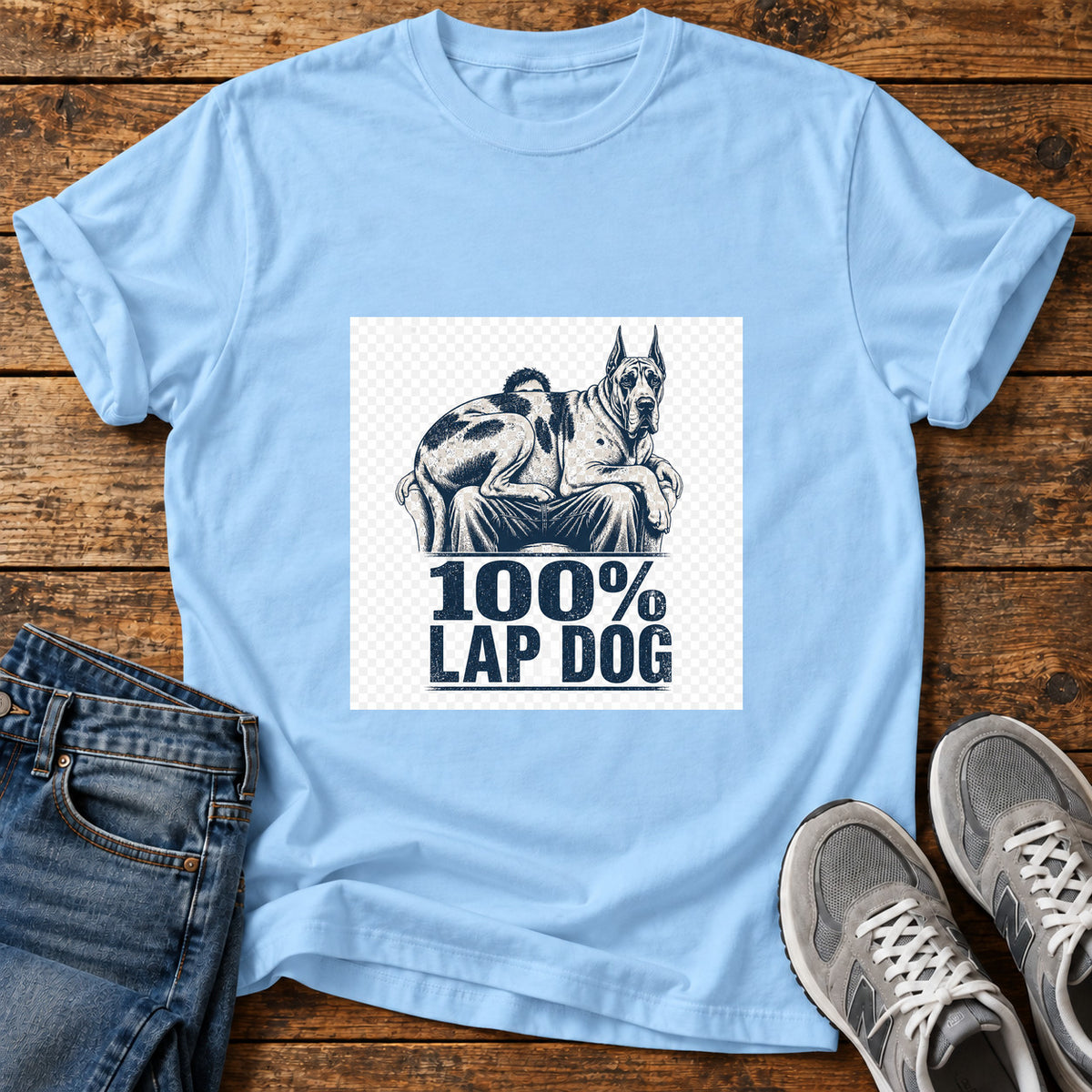 100% Lap Dog Great Dane graphic T-shirt in Light Blue, shown on a flat-lay shirt mockup