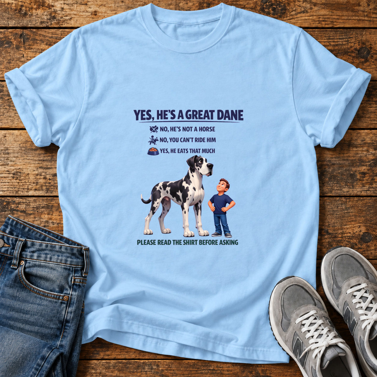 Great Dane Humor graphic T-shirt in Light Blue, shown on a flat-lay shirt mockup
