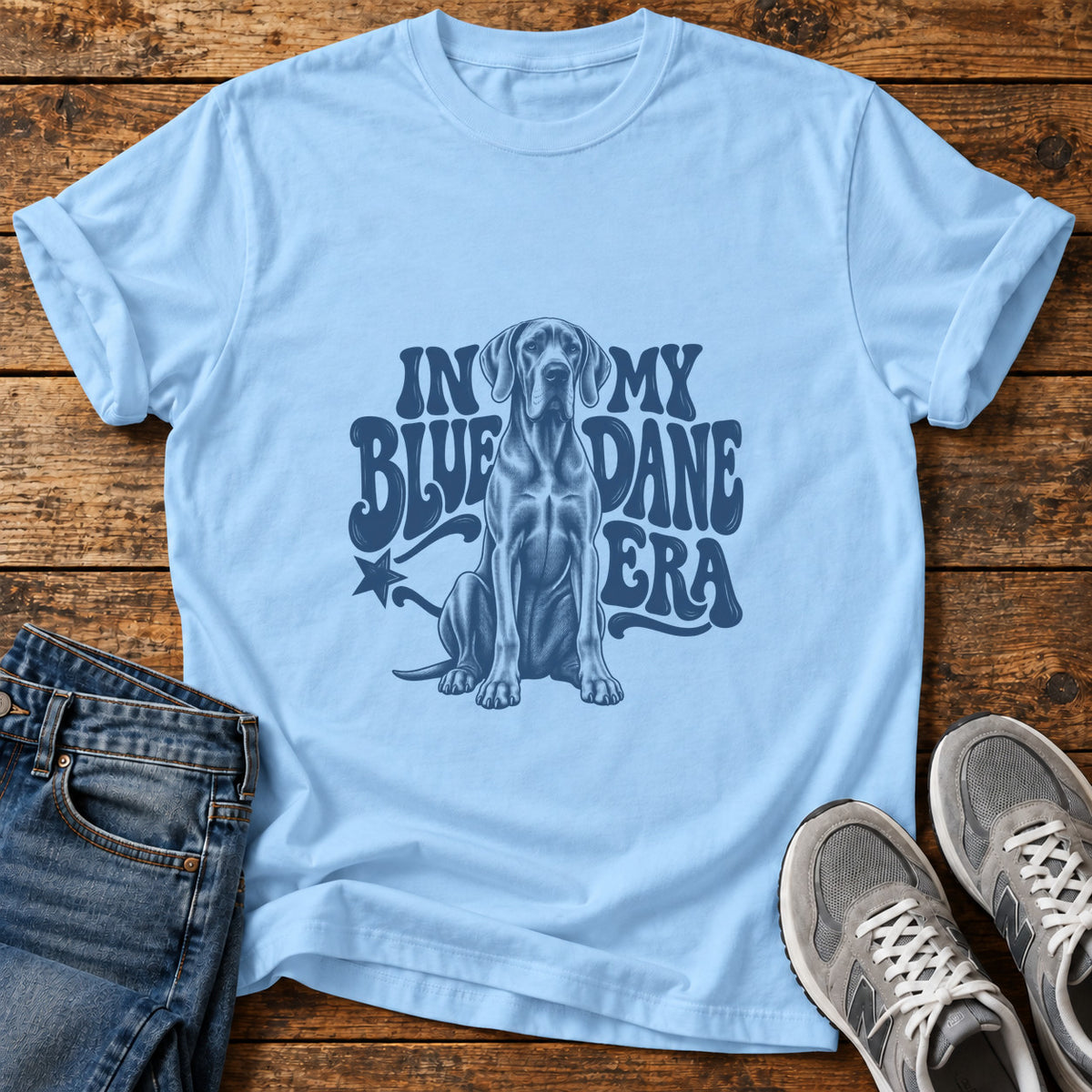 Blue Dane Era Great Dane graphic T-shirt in Light Blue, shown on a flat-lay shirt mockup