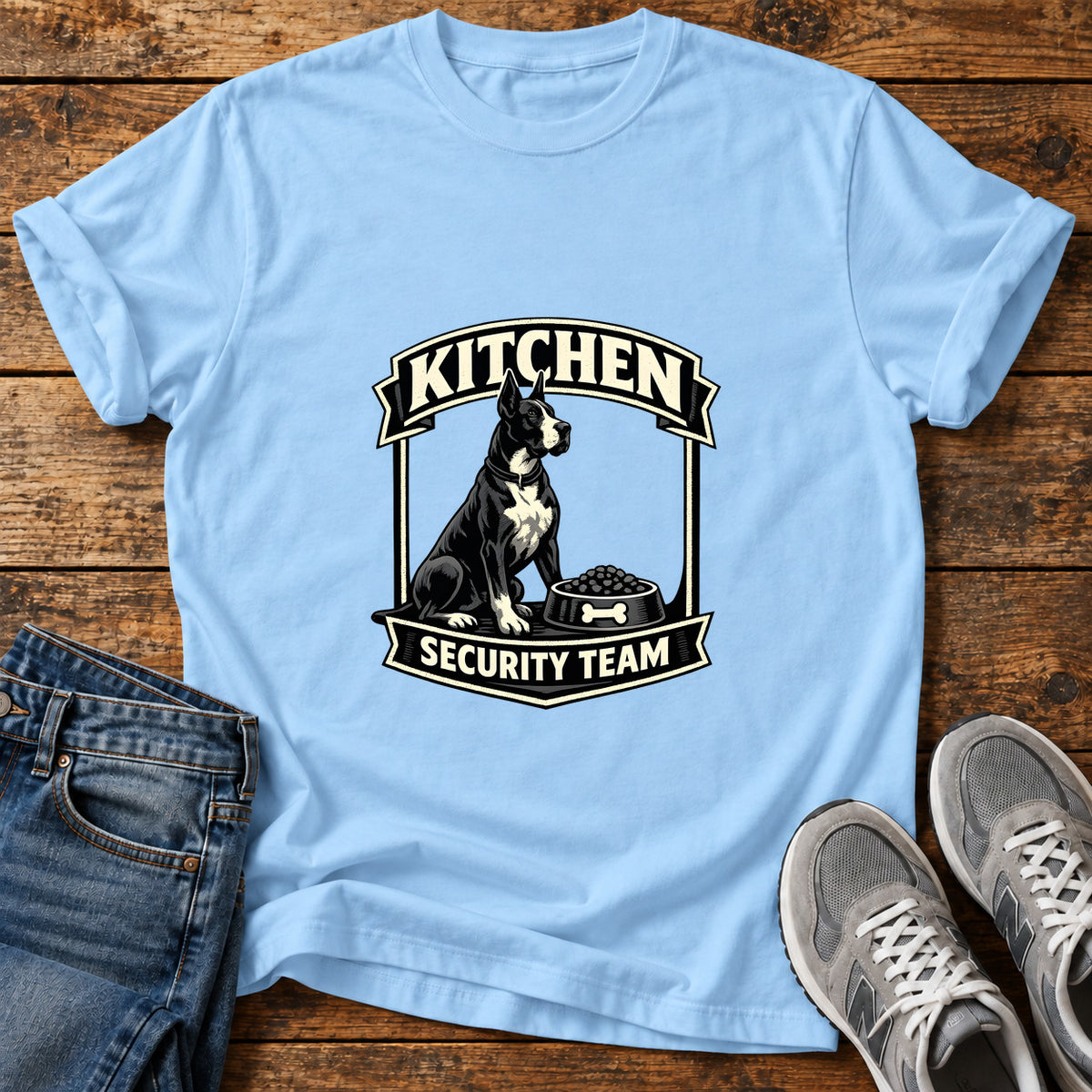 Kitchen Security Great Dane graphic T-shirt in Light Blue, shown on a flat-lay shirt mockup