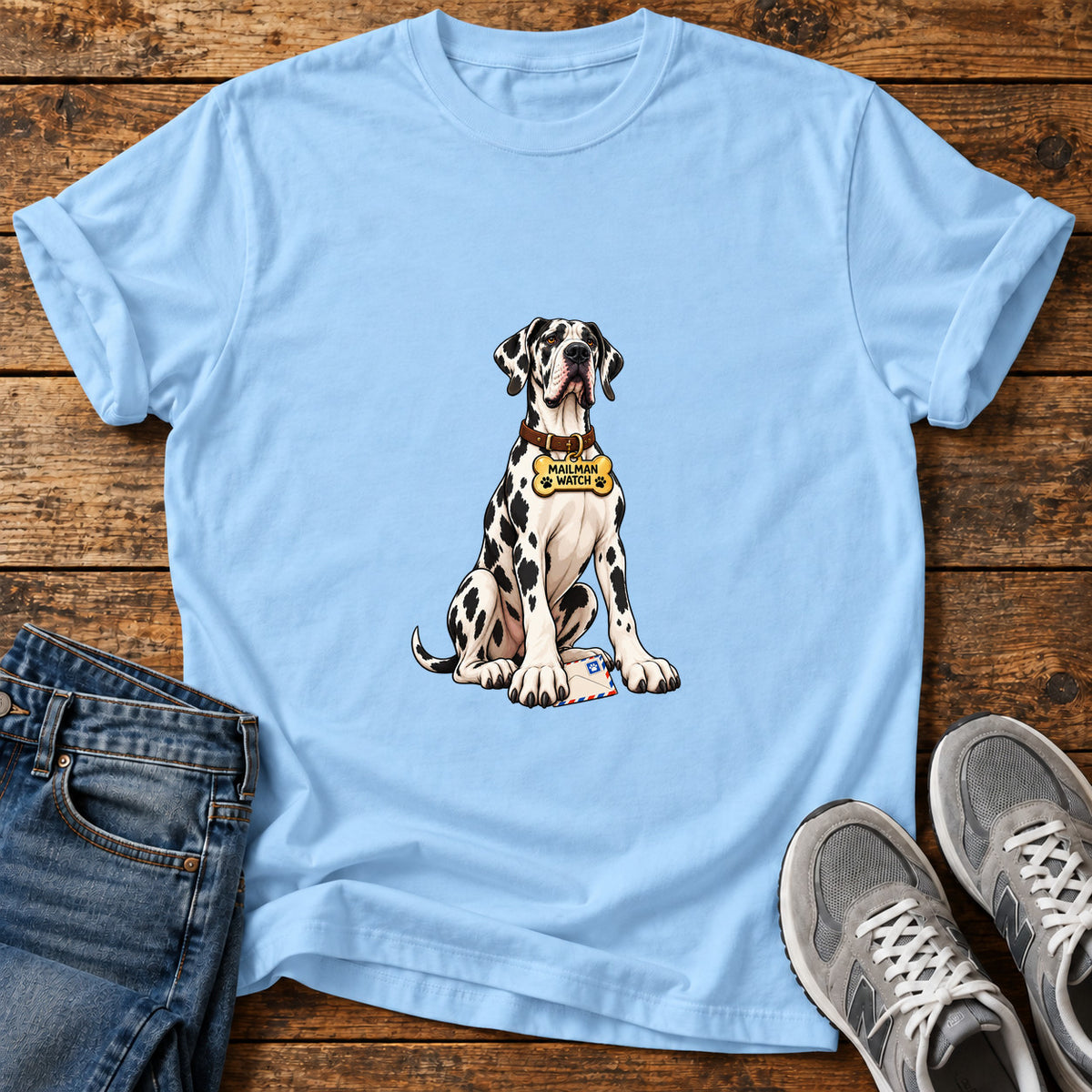 Mailman Watch Great Dane graphic T-shirt in Light Blue, shown on a flat-lay shirt mockup