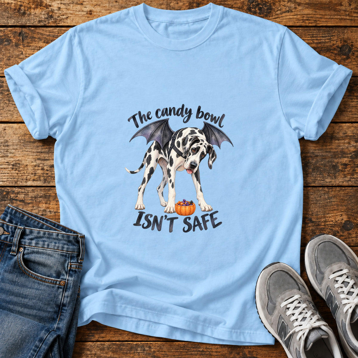 Candy Bowl Menace Great Dane graphic T-shirt in Light Blue, shown on a flat-lay shirt mockup
