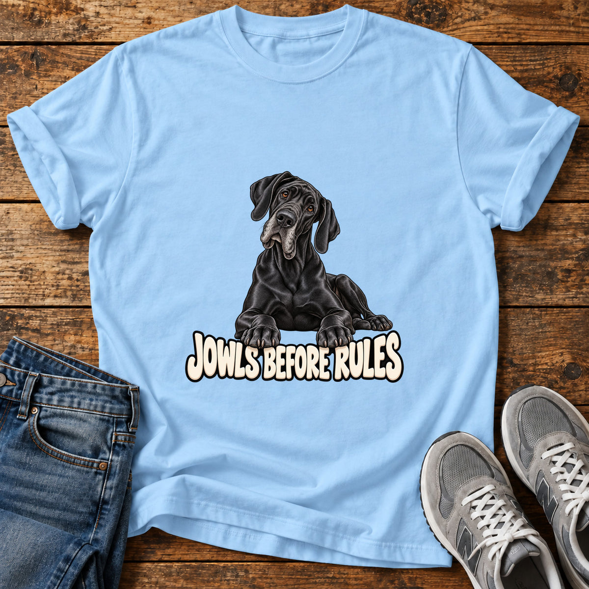 Jowls Before Rules Great Dane graphic T-shirt in Light Blue, shown on a flat-lay shirt mockup