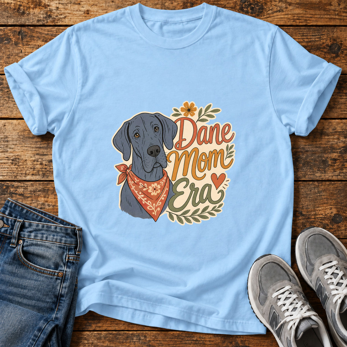 Dane Mom Era Great Dane graphic T-shirt in Light Blue, shown on a flat-lay shirt mockup