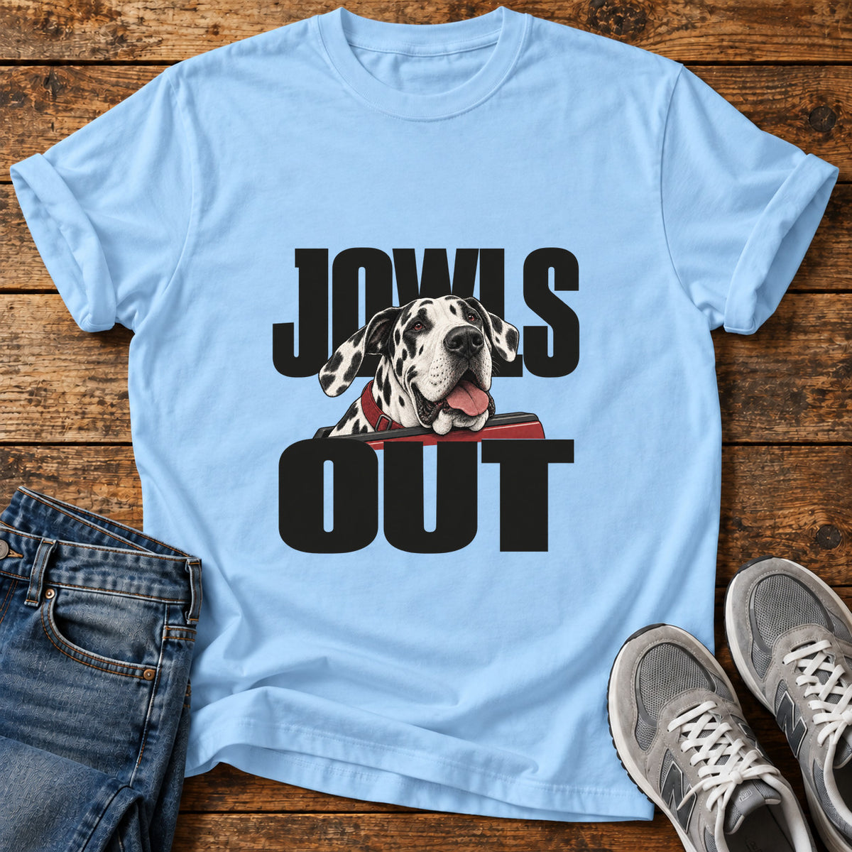 Jowls Out Great Dane graphic T-shirt in Light Blue, shown on a flat-lay shirt mockup