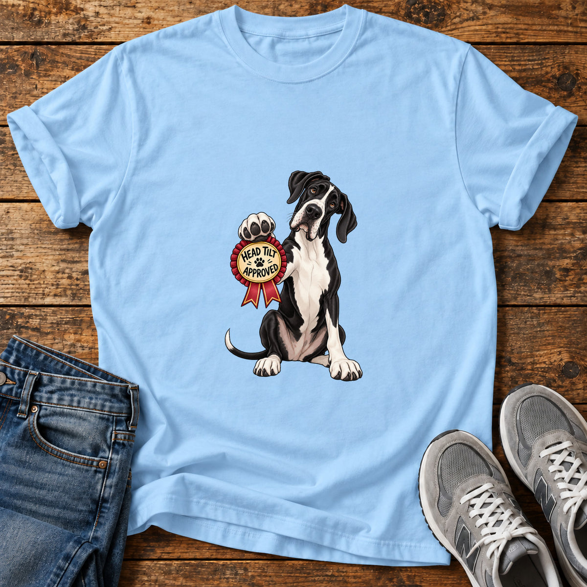 Head Tilt Approved Great Dane graphic T-shirt in Light Blue, shown on a flat-lay shirt mockup