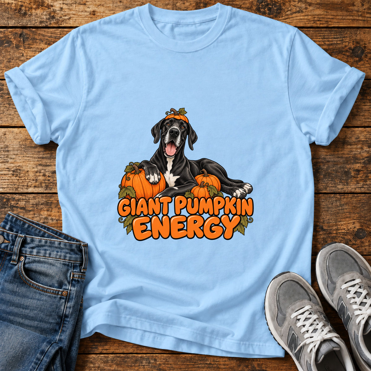 Giant Pumpkin Energy Great Dane graphic T-shirt in Light Blue, shown on a flat-lay shirt mockup