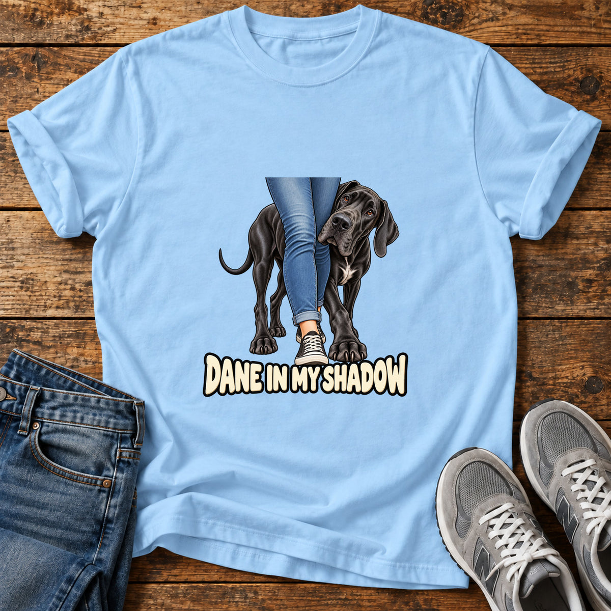 Dane In Shadow Great Dane graphic T-shirt in Light Blue, shown on a flat-lay shirt mockup