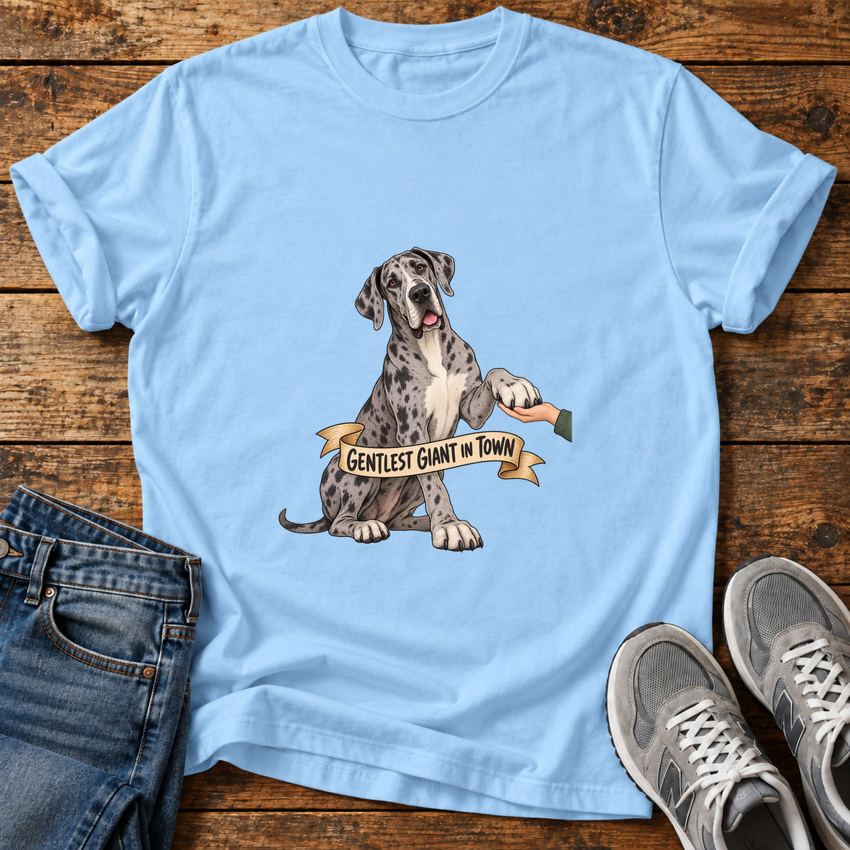 Gentlest Giant Great Dane graphic T-shirt in Light Blue, shown on a flat-lay shirt mockup