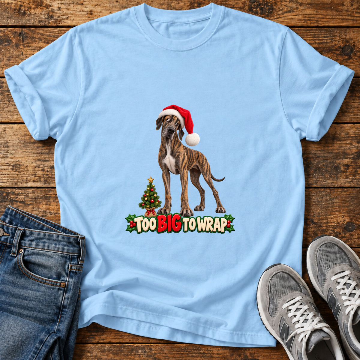 Too Big Wrap Great Dane graphic T-shirt in Light Blue, shown on a flat-lay shirt mockup