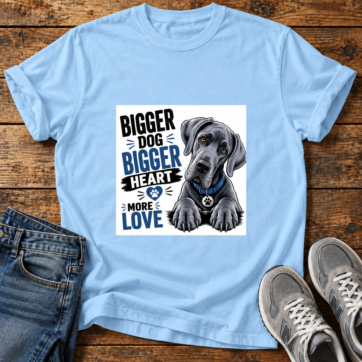 Bigger Heart Great Dane graphic T-shirt in Light Blue, shown on a flat-lay shirt mockup