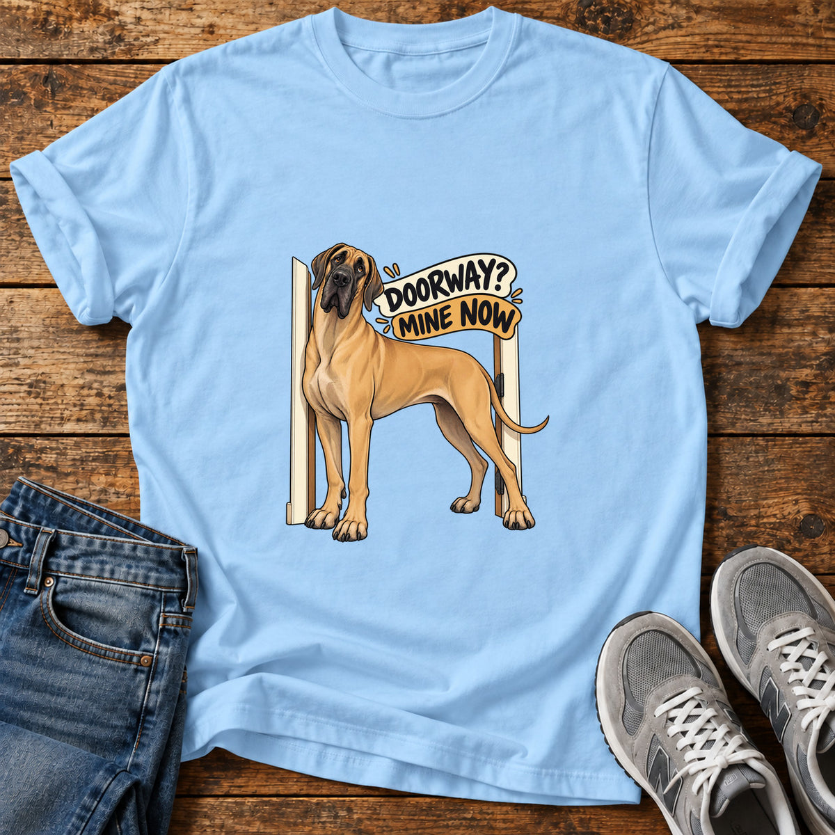 Doorway Takeover Great Dane graphic T-shirt in Light Blue, shown on a flat-lay shirt mockup