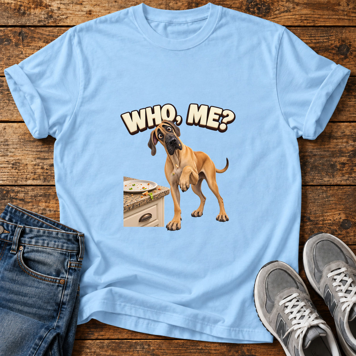 Who Me Dog Great Dane graphic T-shirt in Light Blue, shown on a flat-lay shirt mockup