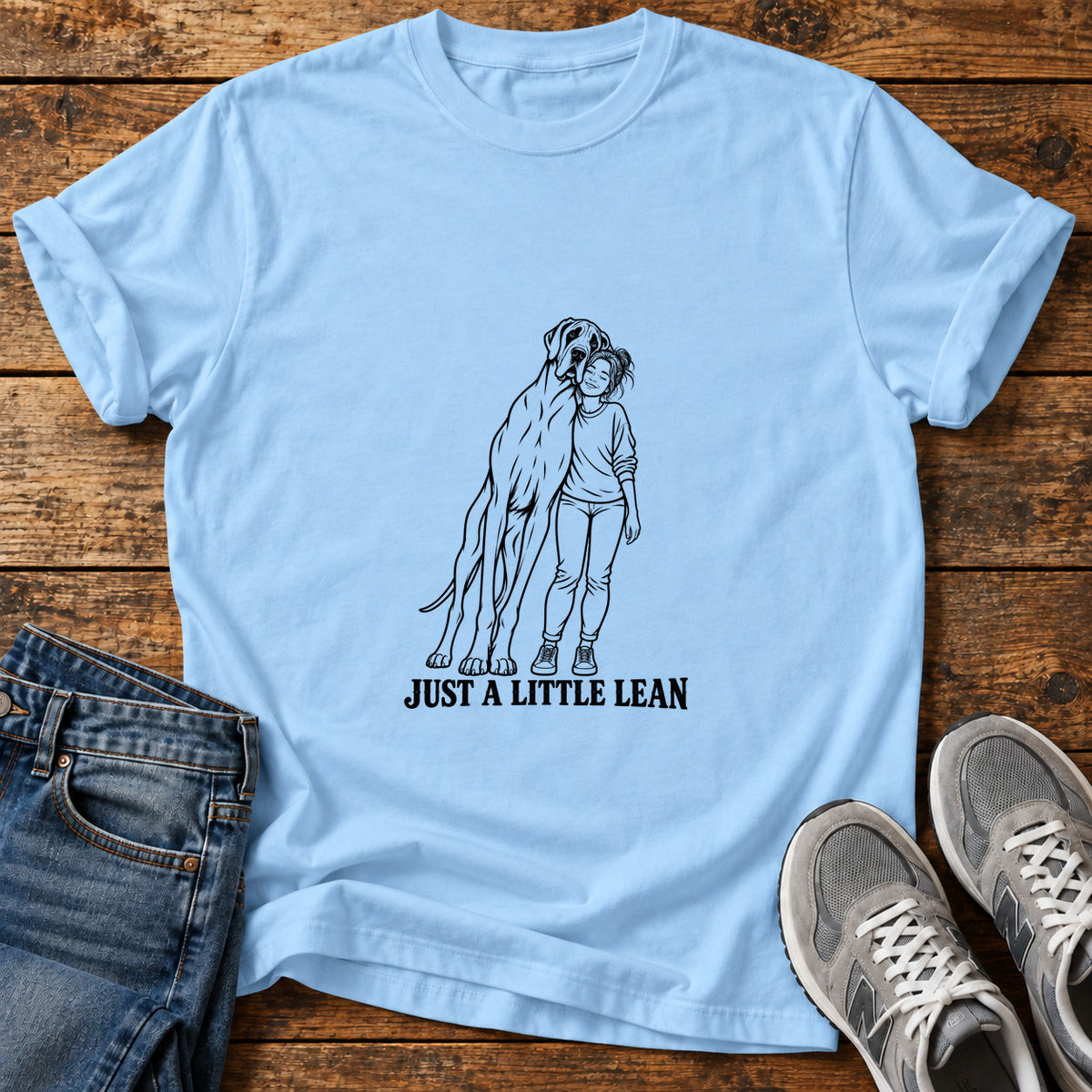 Just A Little Great Dane graphic T-shirt in Light Blue, shown on a flat-lay shirt mockup