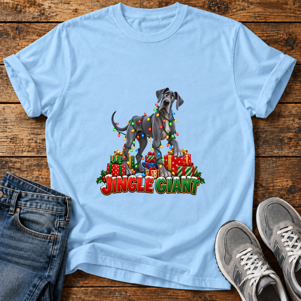 Jingle Giant Great Dane graphic T-shirt in Light Blue, shown on a flat-lay shirt mockup