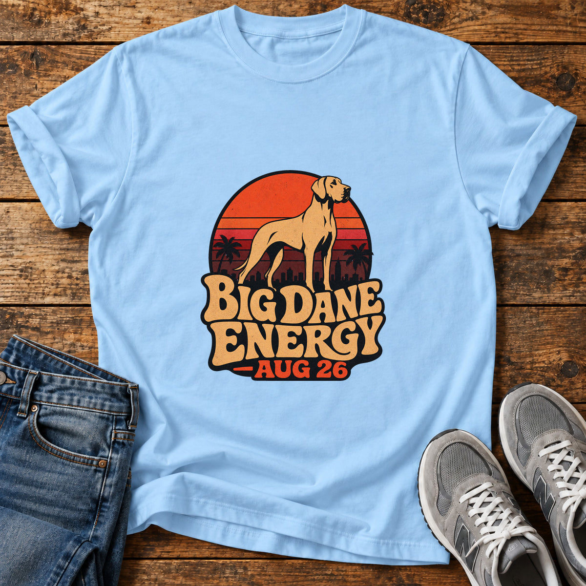 Big Dane Energy Great Dane graphic T-shirt in Light Blue, shown on a flat-lay shirt mockup