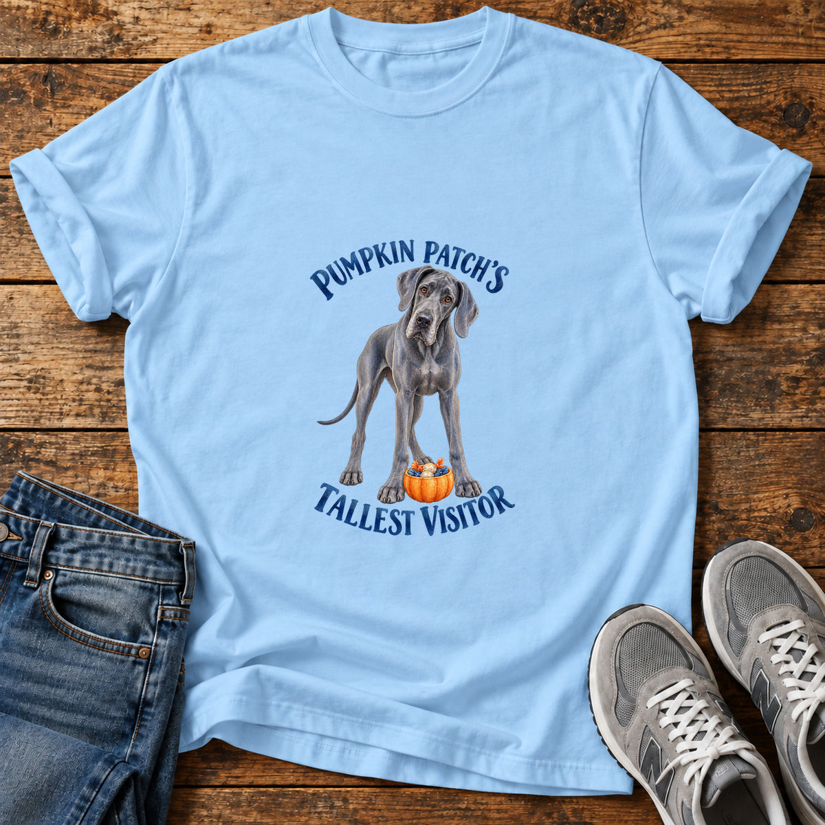 Tallest Visitor Great Dane graphic T-shirt in Light Blue, shown on a flat-lay shirt mockup