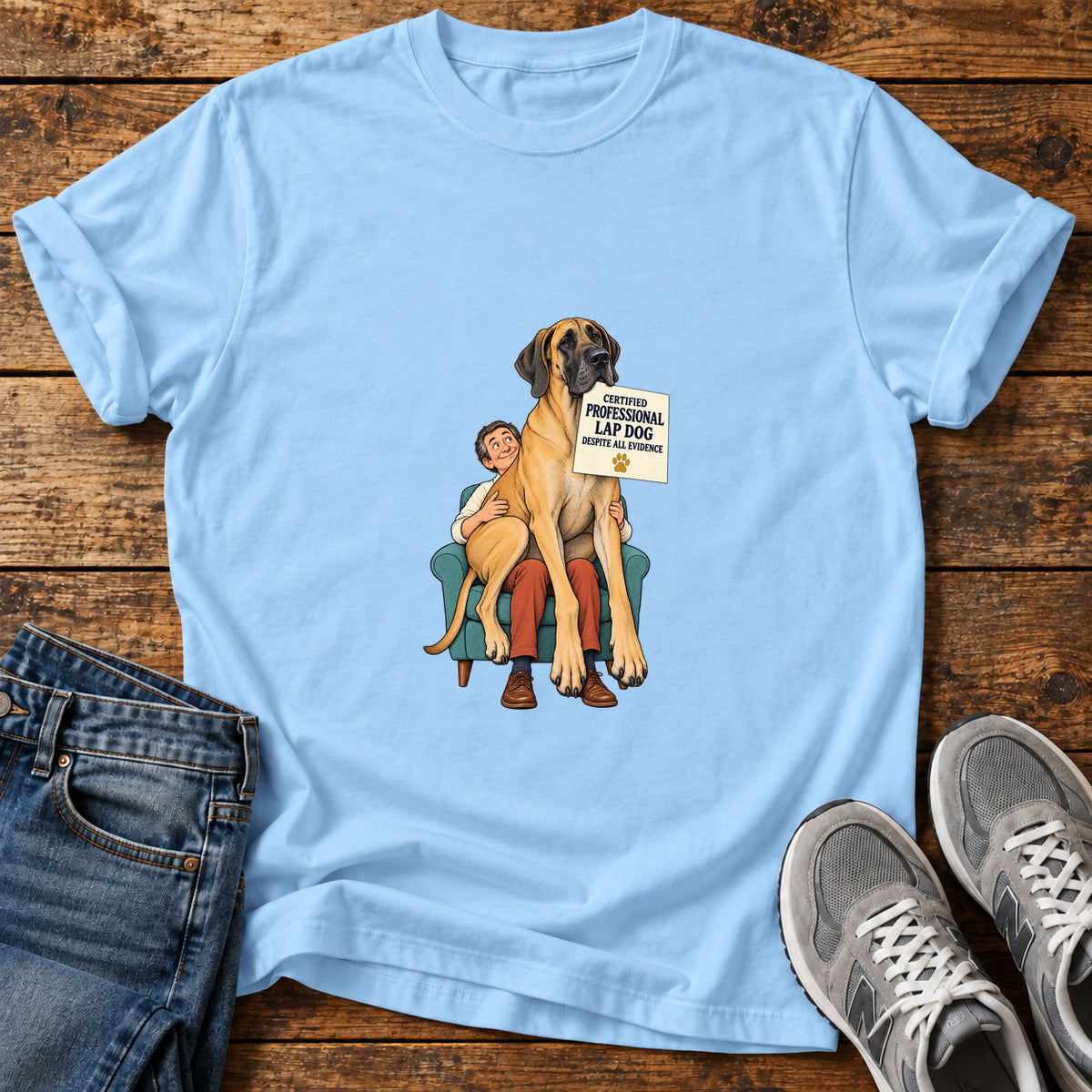 Professional Lap Dog Great Dane graphic T-shirt in Light Blue, shown on a flat-lay shirt mockup
