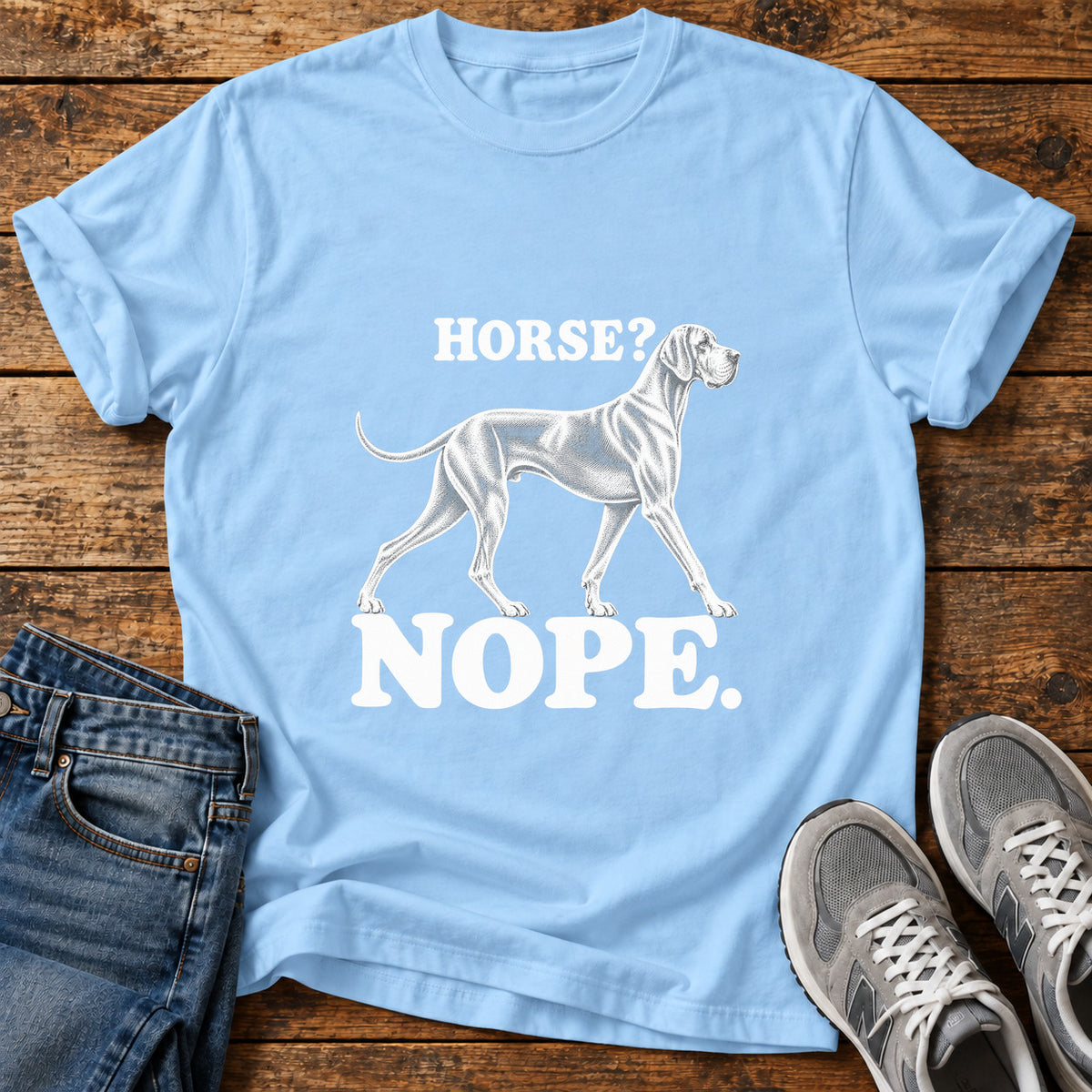 Horse Nope Great Dane graphic T-shirt in Light Blue, shown on a flat-lay shirt mockup