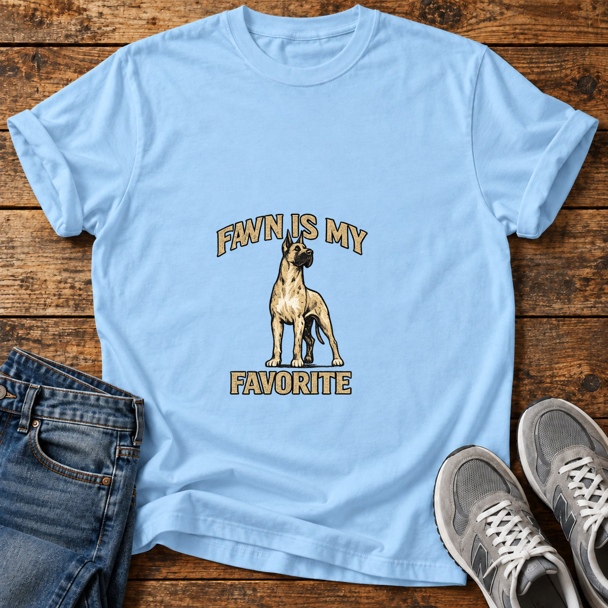 Fawn Favorite Great Dane graphic T-shirt in Light Blue, shown on a flat-lay shirt mockup