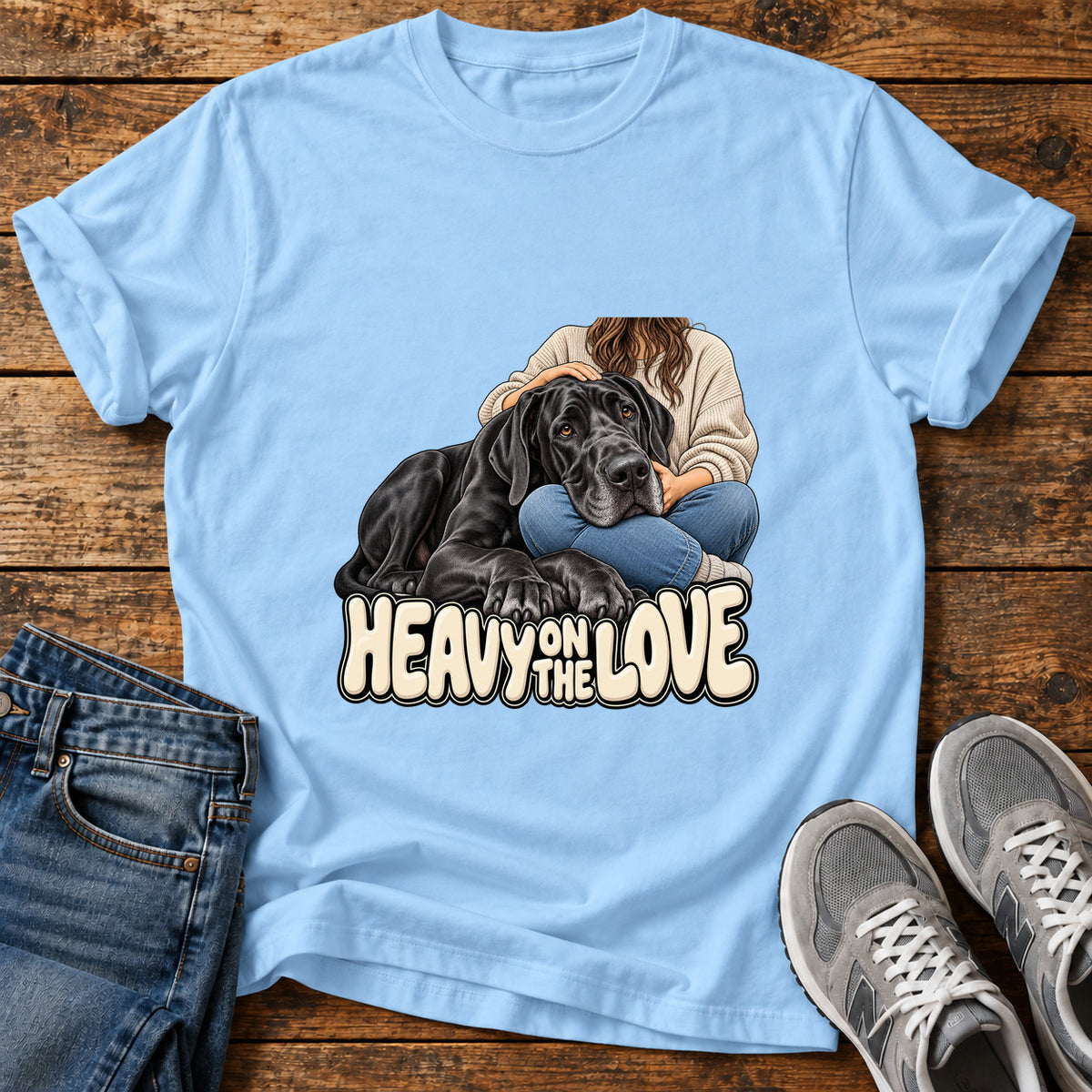 Heavy Love Great Dane graphic T-shirt in Light Blue, shown on a flat-lay shirt mockup