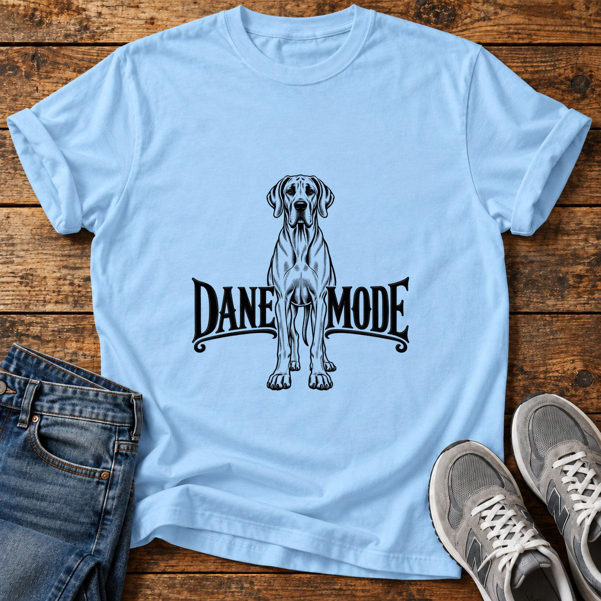Dane Mode Great Dane graphic T-shirt in Light Blue, shown on a flat-lay shirt mockup