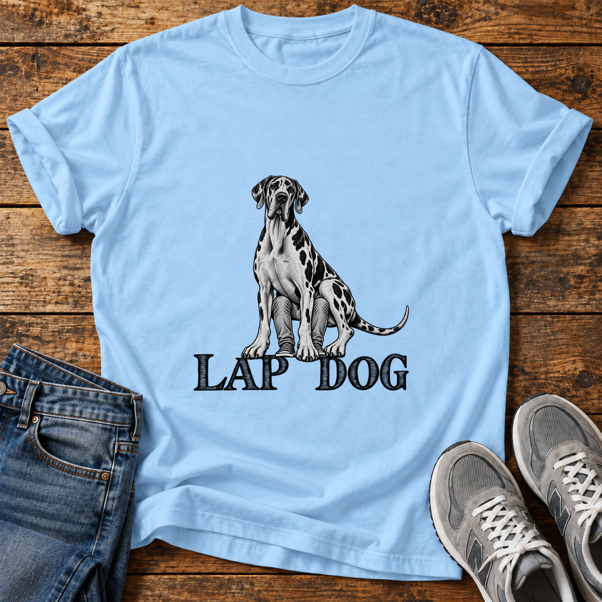 Lap Dog Great Dane graphic T-shirt in Light Blue, shown on a flat-lay shirt mockup