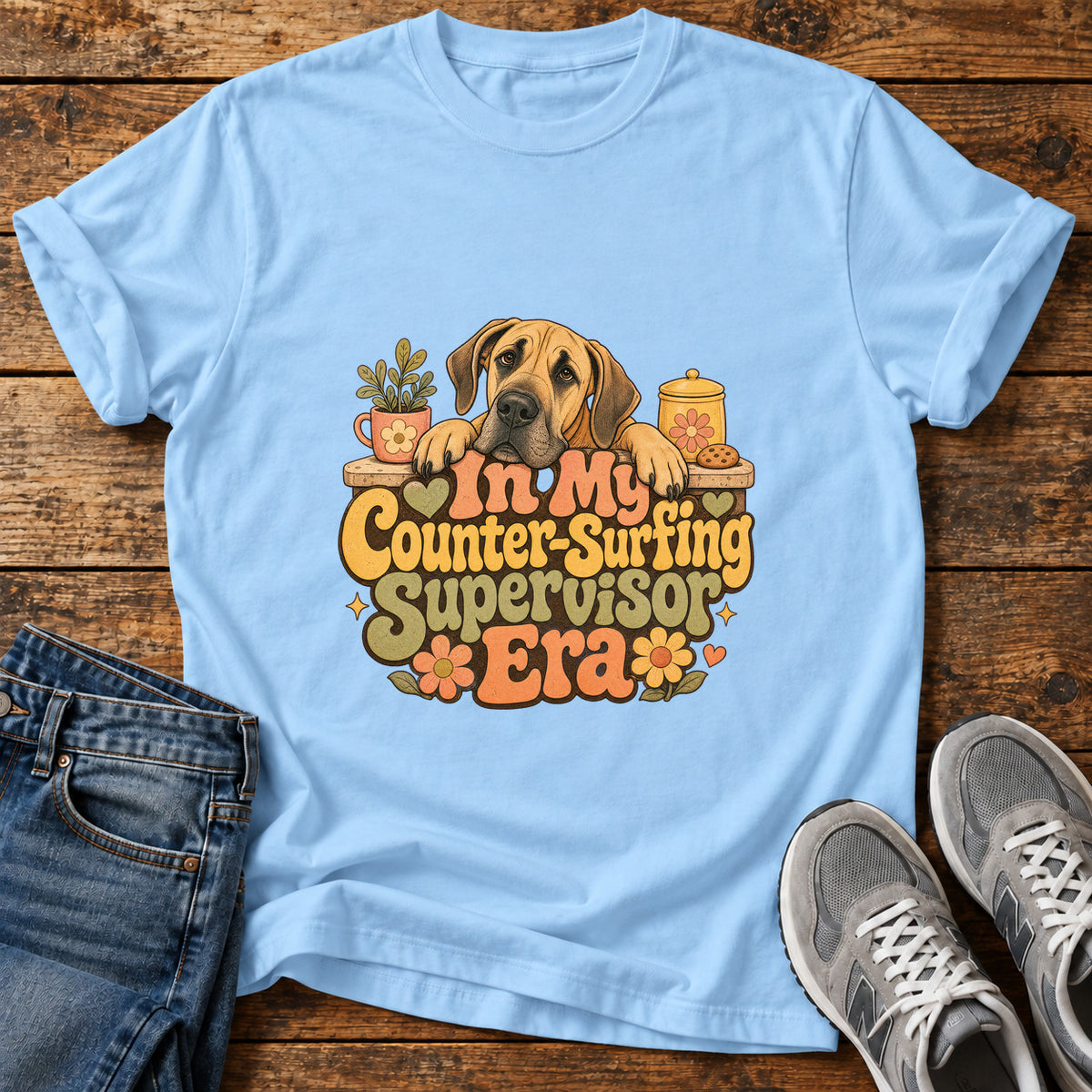 Counter-Surfing Supervisor Great Dane graphic T-shirt in Light Blue, shown on a flat-lay shirt mockup