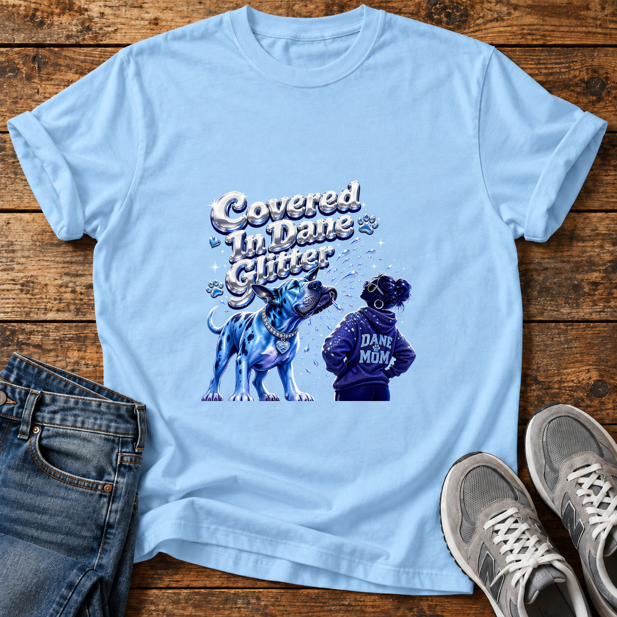 Dane Glitter Great Dane graphic T-shirt in Light Blue, shown on a flat-lay shirt mockup