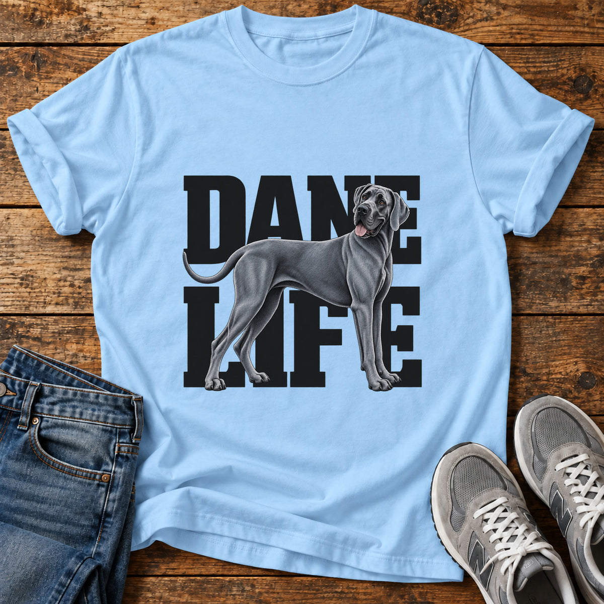 Dane Life Great Dane graphic T-shirt in Light Blue, shown on a flat-lay shirt mockup