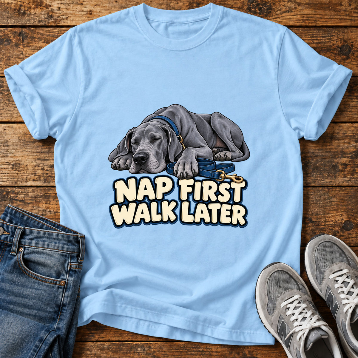 Nap First Great Dane graphic T-shirt in Light Blue, shown on a flat-lay shirt mockup