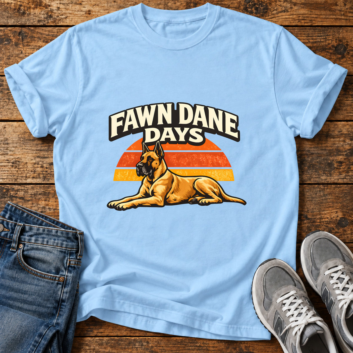 Fawn Dane Days Great Dane graphic T-shirt in Light Blue, shown on a flat-lay shirt mockup