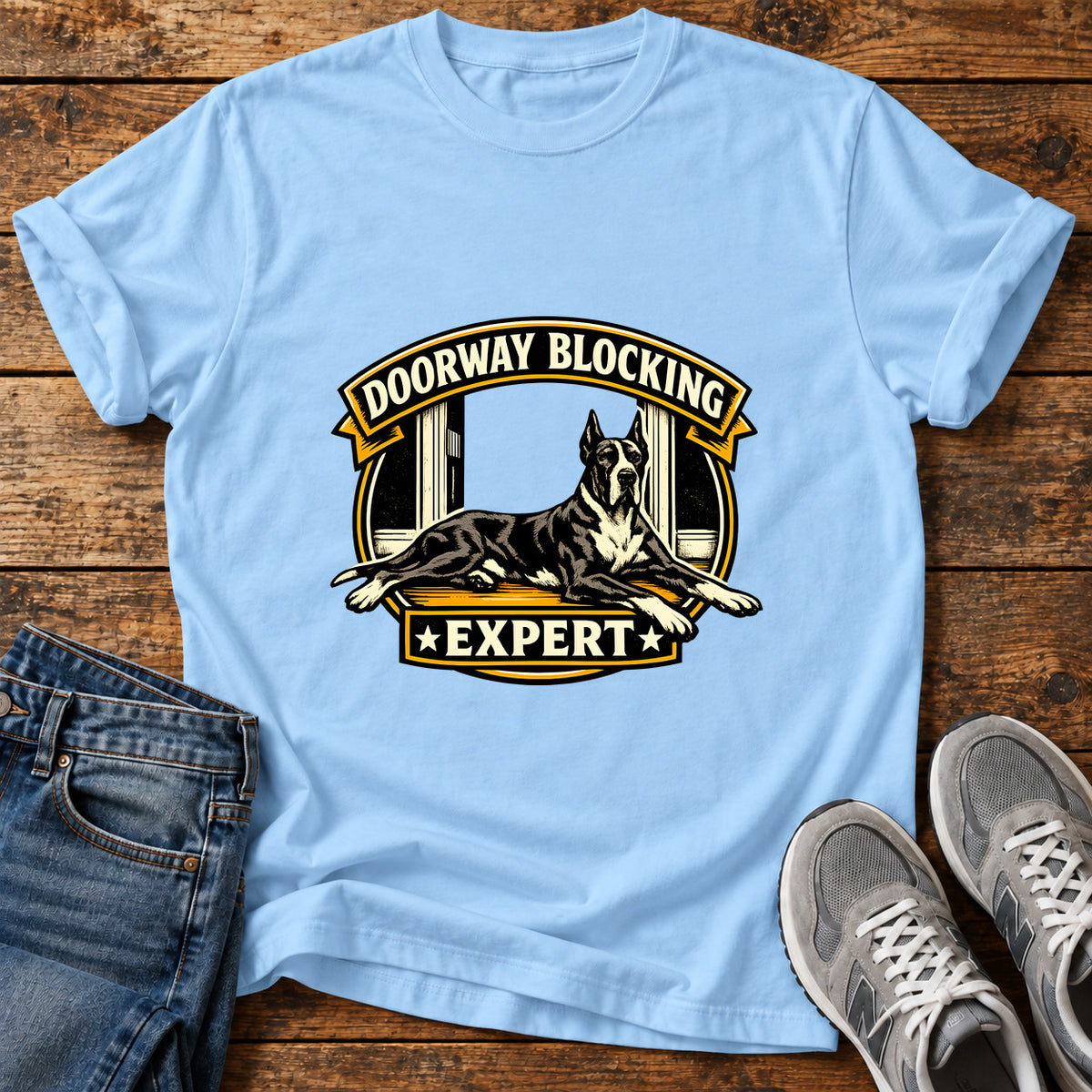 Doorway Expert Great Dane graphic T-shirt in Light Blue, shown on a flat-lay shirt mockup