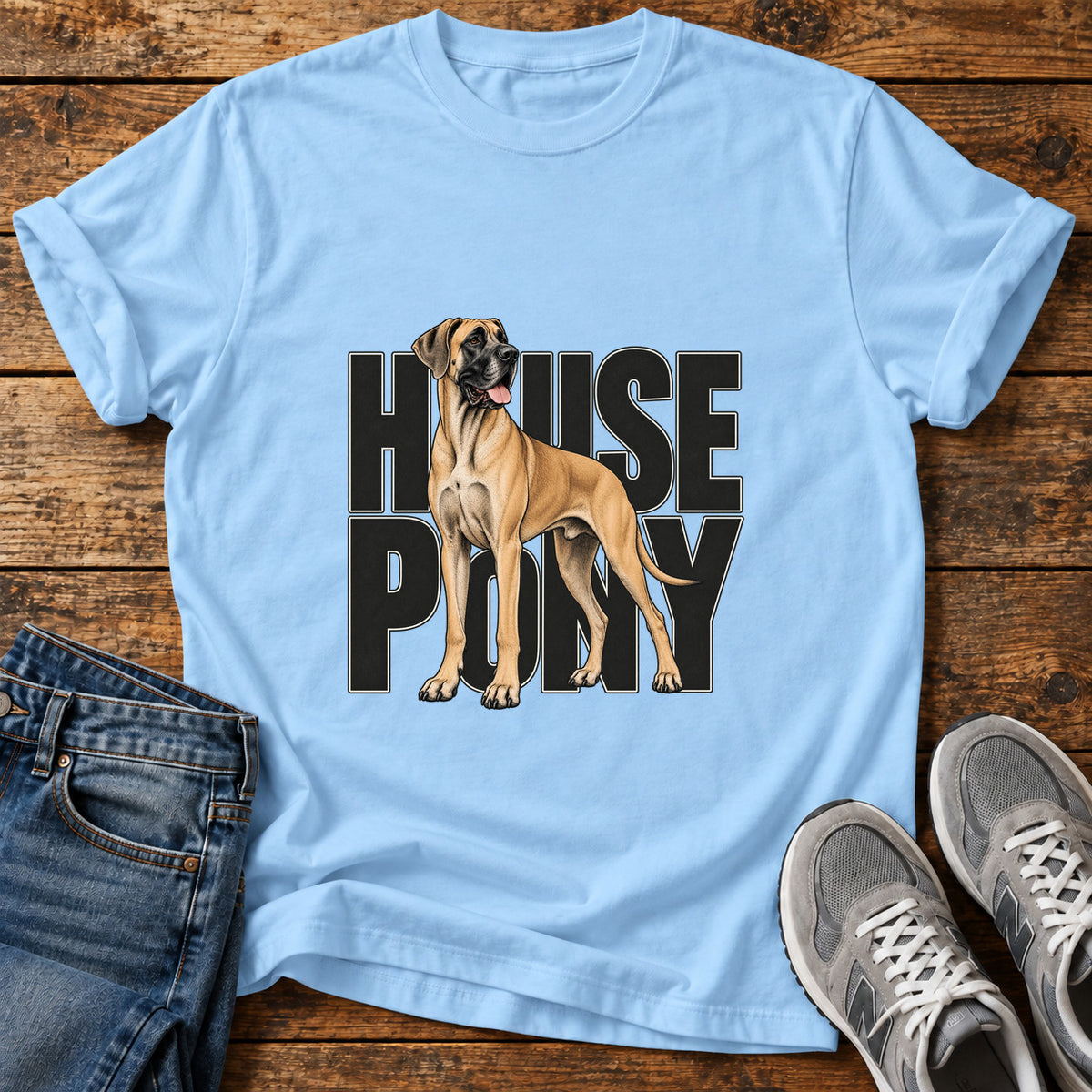 House Pony Great Dane graphic T-shirt in Light Blue, shown on a flat-lay shirt mockup