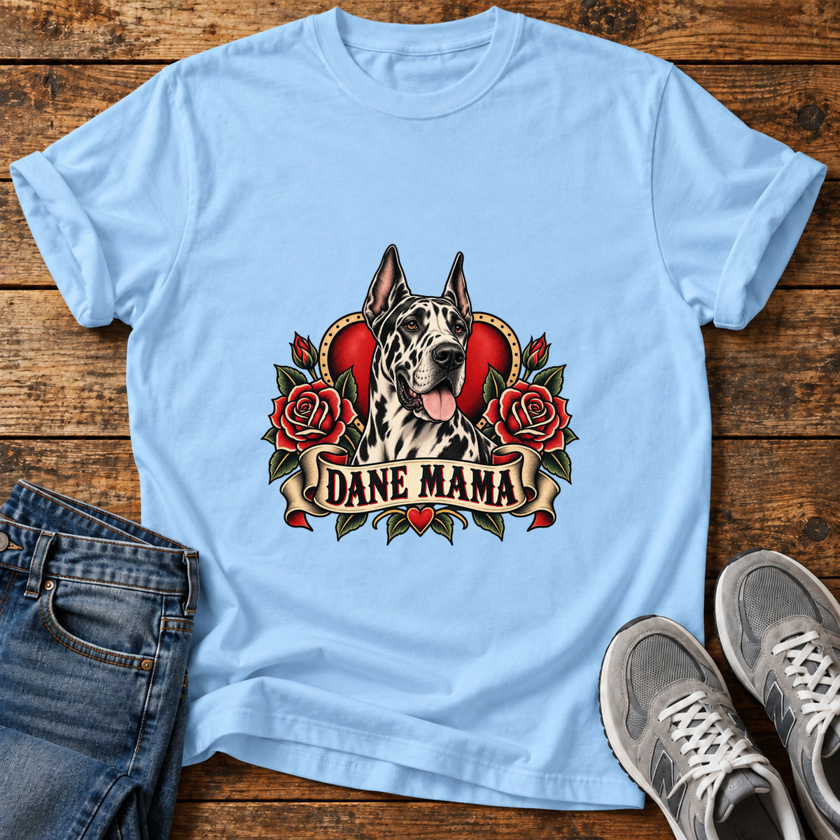 Dane Mama Great Dane graphic T-shirt in Light Blue, shown on a flat-lay shirt mockup