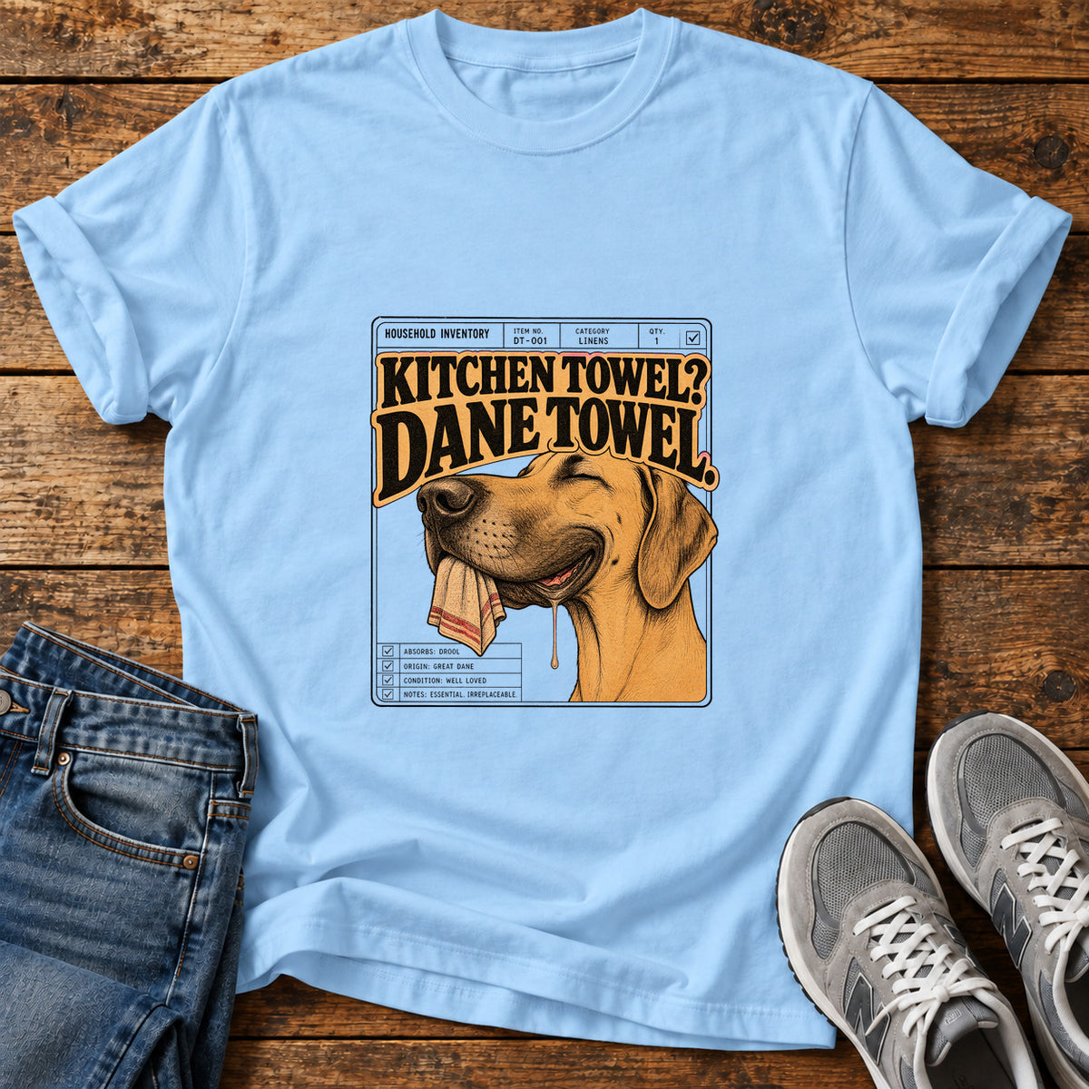 Dane Towel Great Dane graphic T-shirt in Light Blue, shown on a flat-lay shirt mockup