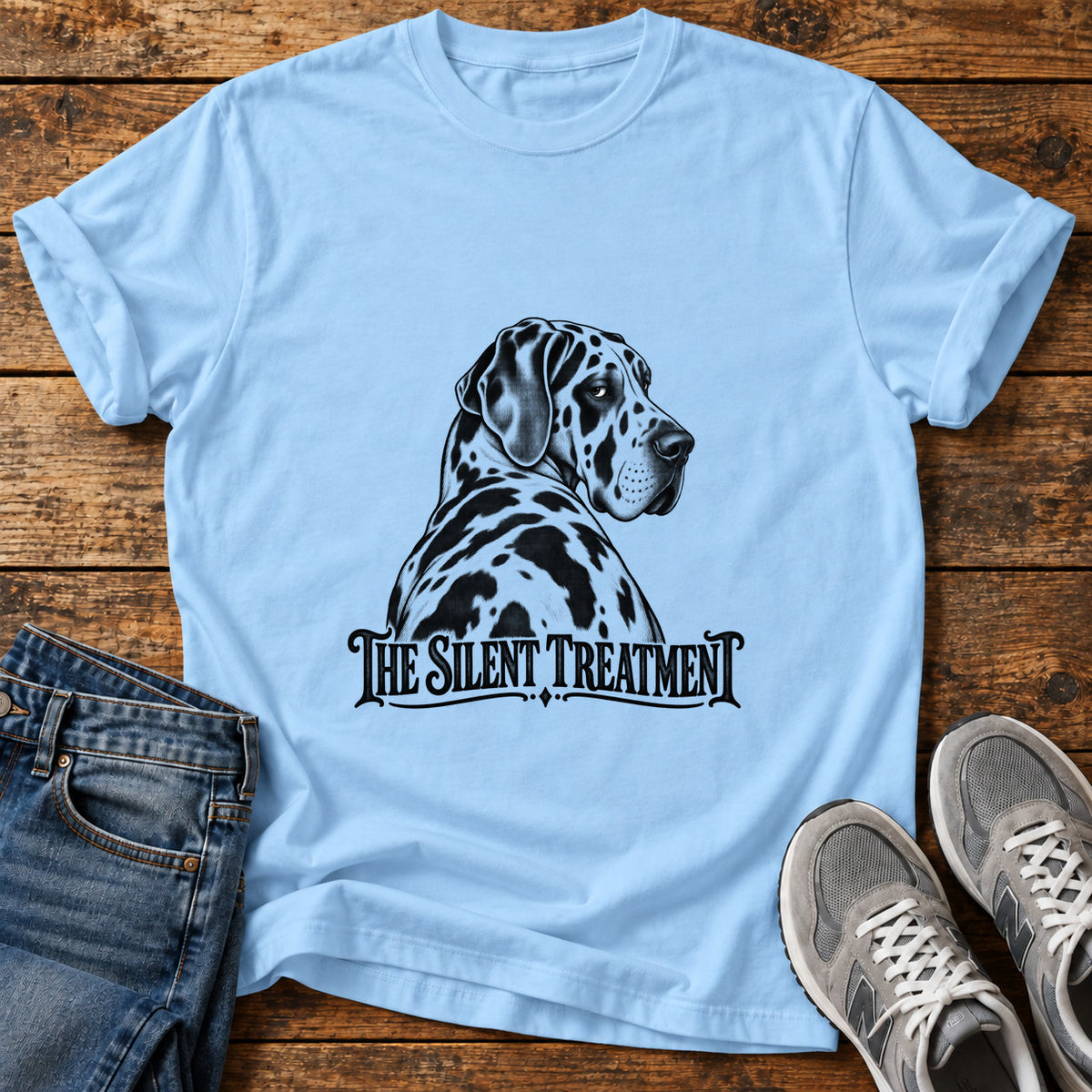 The Silent Treatment Great Dane graphic T-shirt in Light Blue, shown on a flat-lay shirt mockup