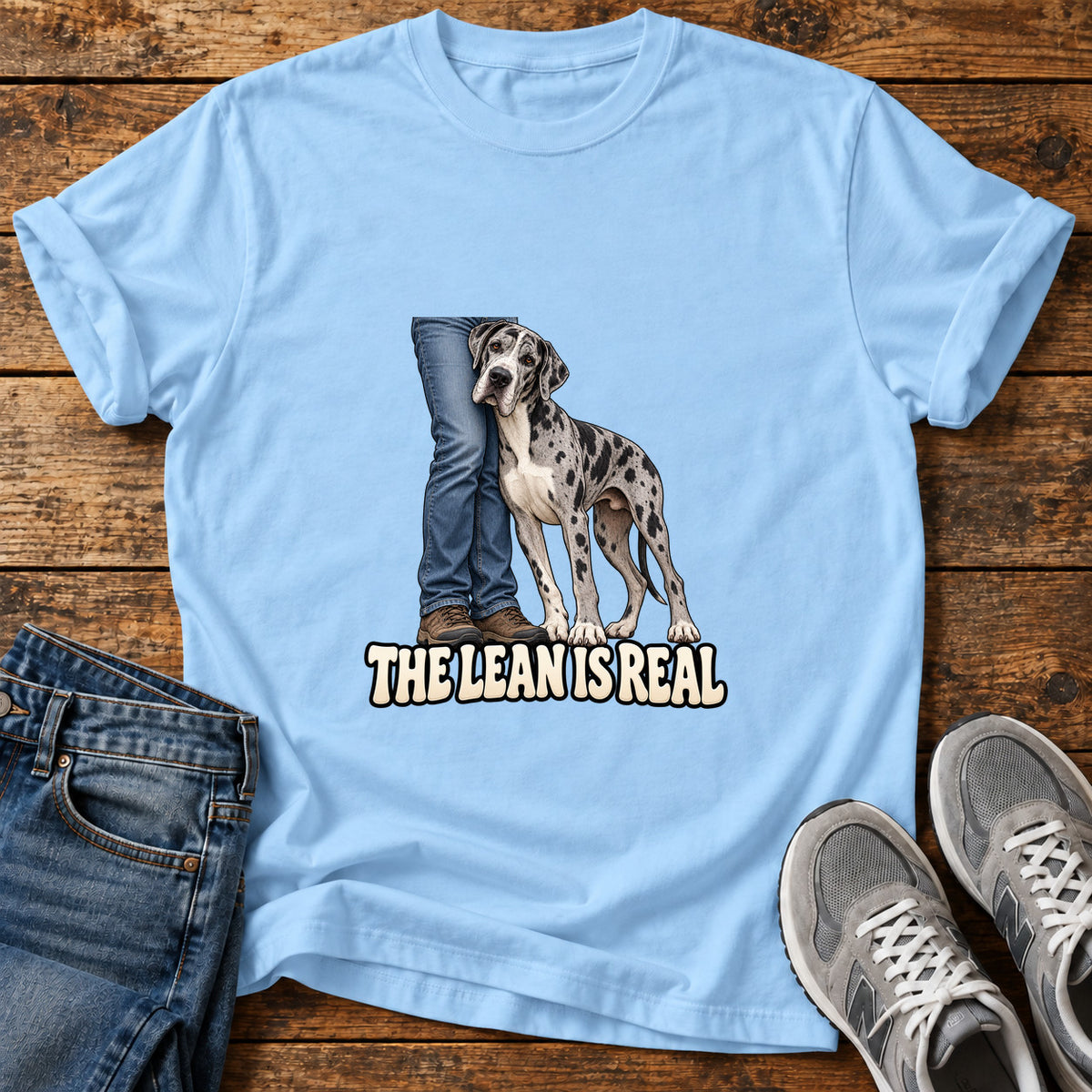 The Lean Great Dane graphic T-shirt in Light Blue, shown on a flat-lay shirt mockup