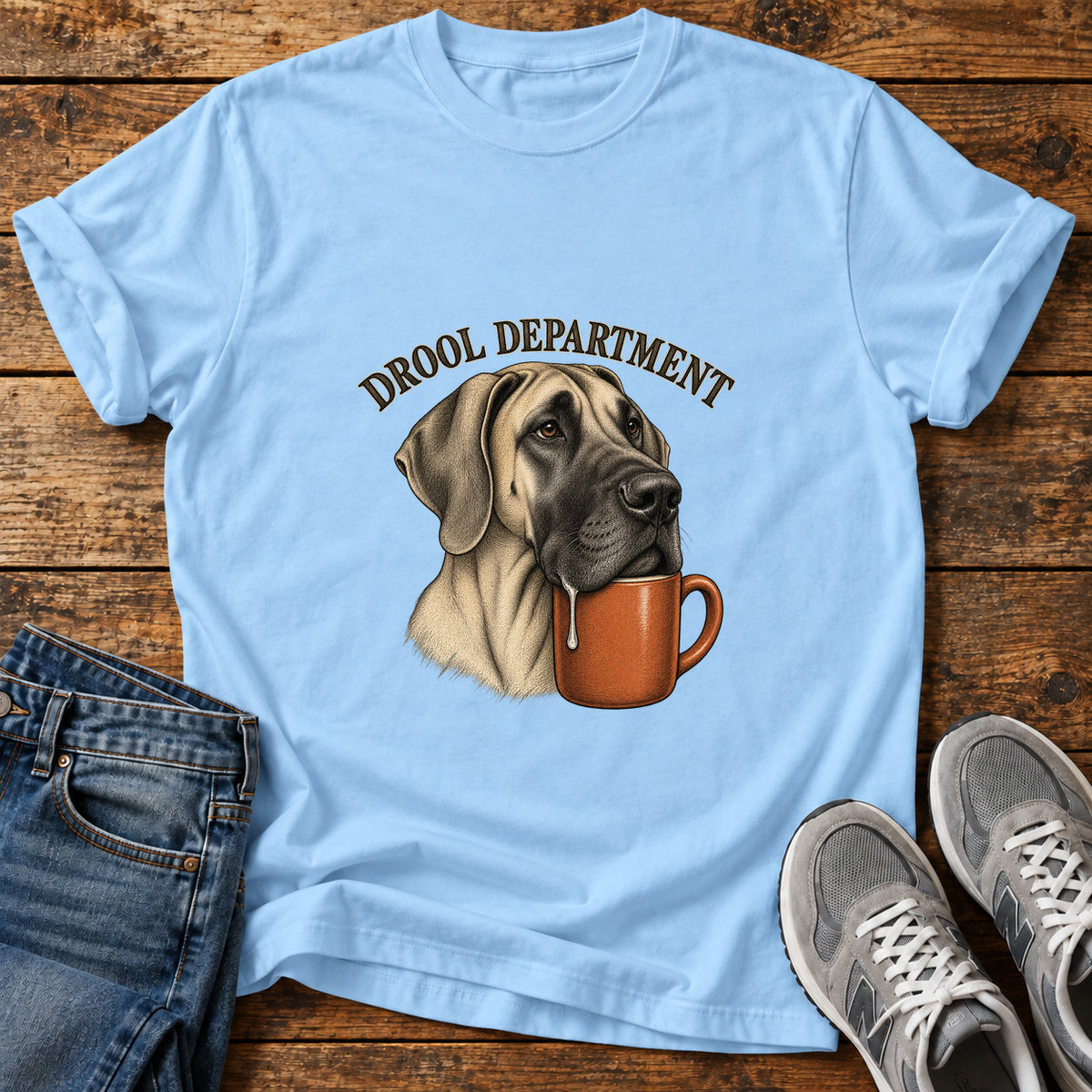Drool Department Great Dane graphic T-shirt in Light Blue, shown on a flat-lay shirt mockup