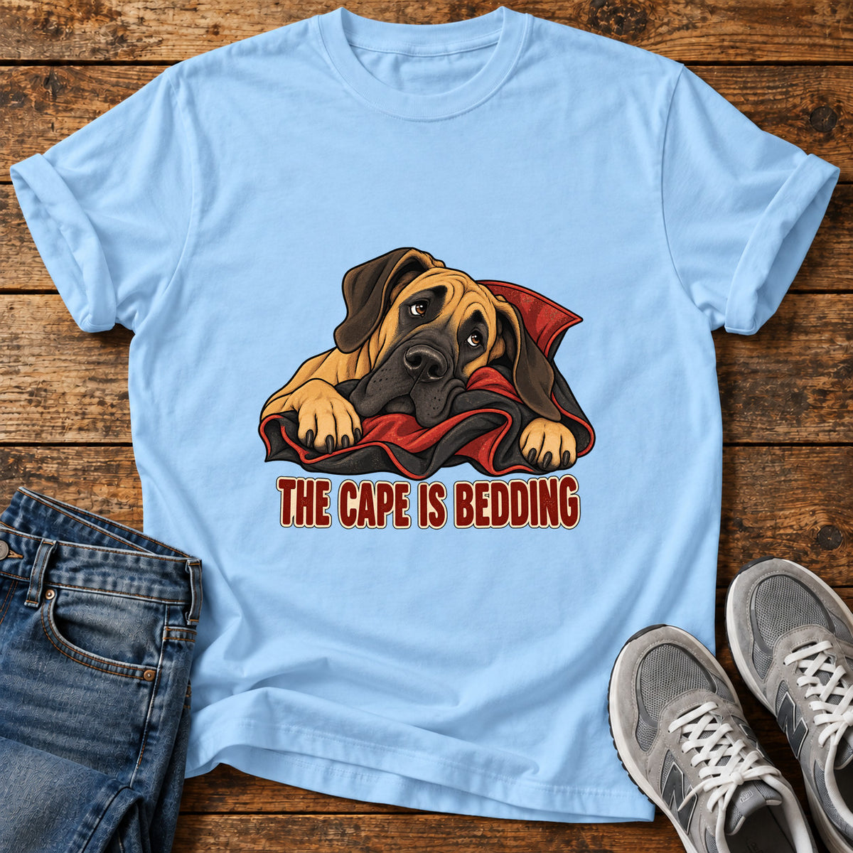 The Cape Bedding Great Dane graphic T-shirt in Light Blue, shown on a flat-lay shirt mockup