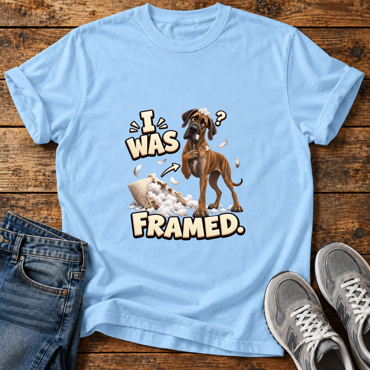 I Was Framed Great Dane graphic T-shirt in Light Blue, shown on a flat-lay shirt mockup