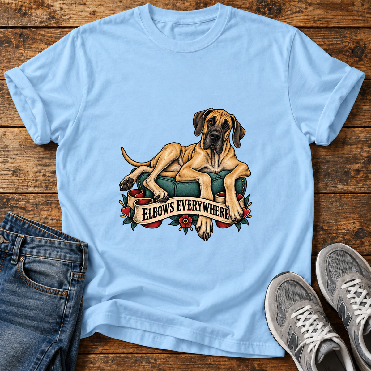 Elbows Everywhere Great Dane graphic T-shirt in Light Blue, shown on a flat-lay shirt mockup