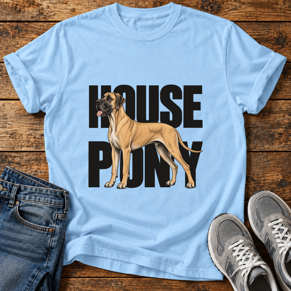 House Pony Great Dane graphic T-shirt in Light Blue, shown on a flat-lay shirt mockup