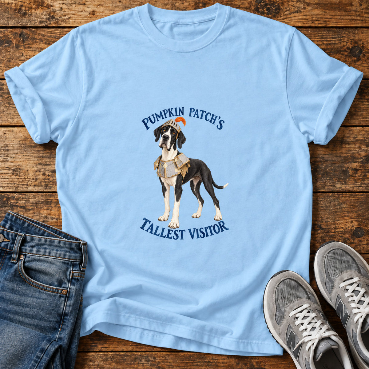 Tallest Visitor Great Dane graphic T-shirt in Light Blue, shown on a flat-lay shirt mockup