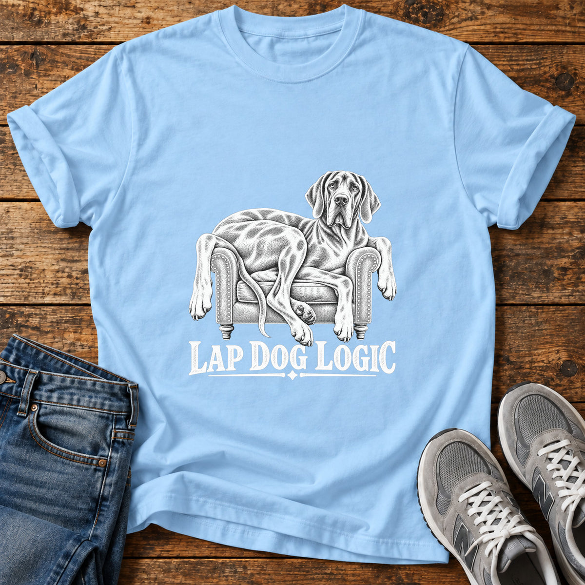 Lap Dog Logic Great Dane graphic T-shirt in Light Blue, shown on a flat-lay shirt mockup