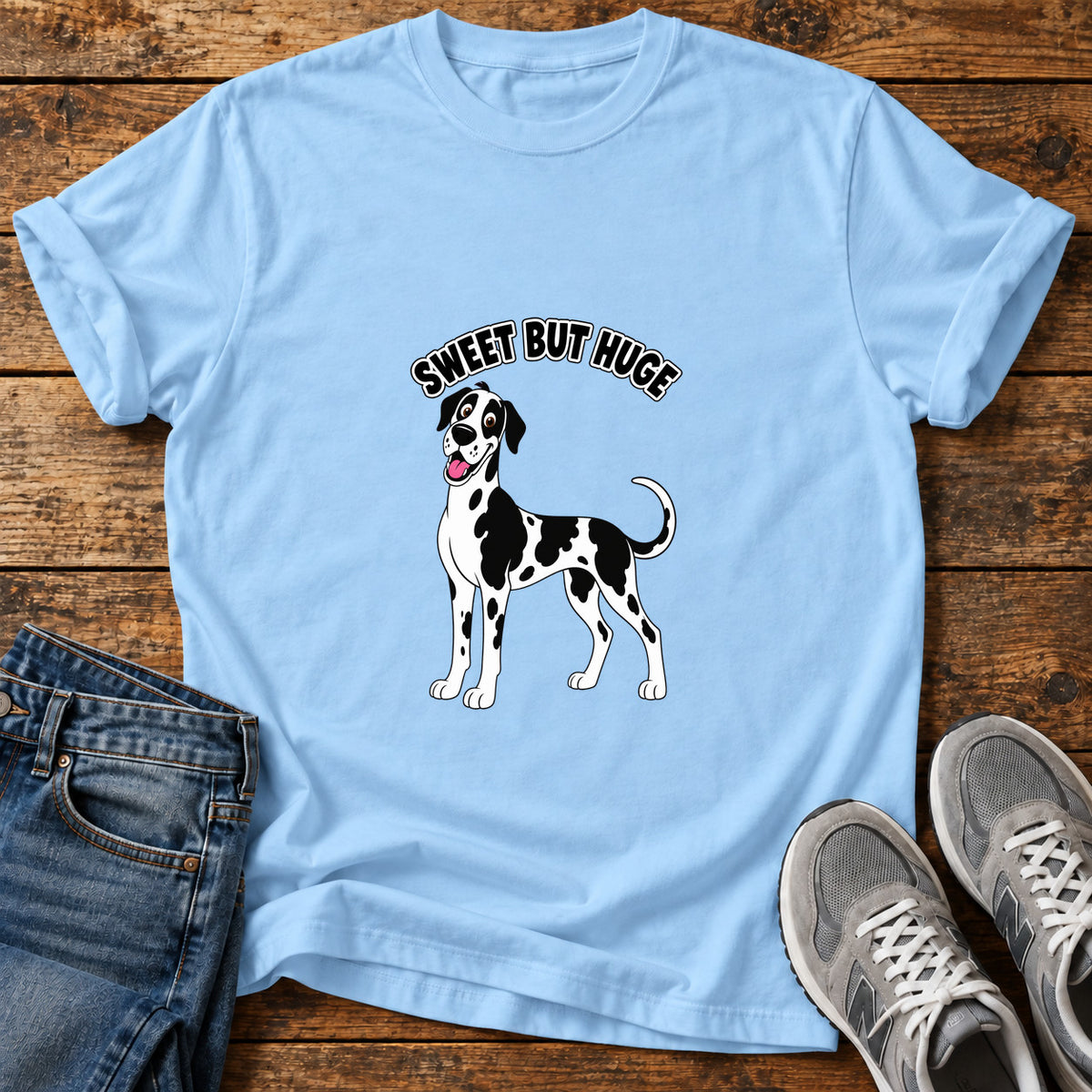 Sweet But Huge Great Dane graphic T-shirt in Light Blue, shown on a flat-lay shirt mockup