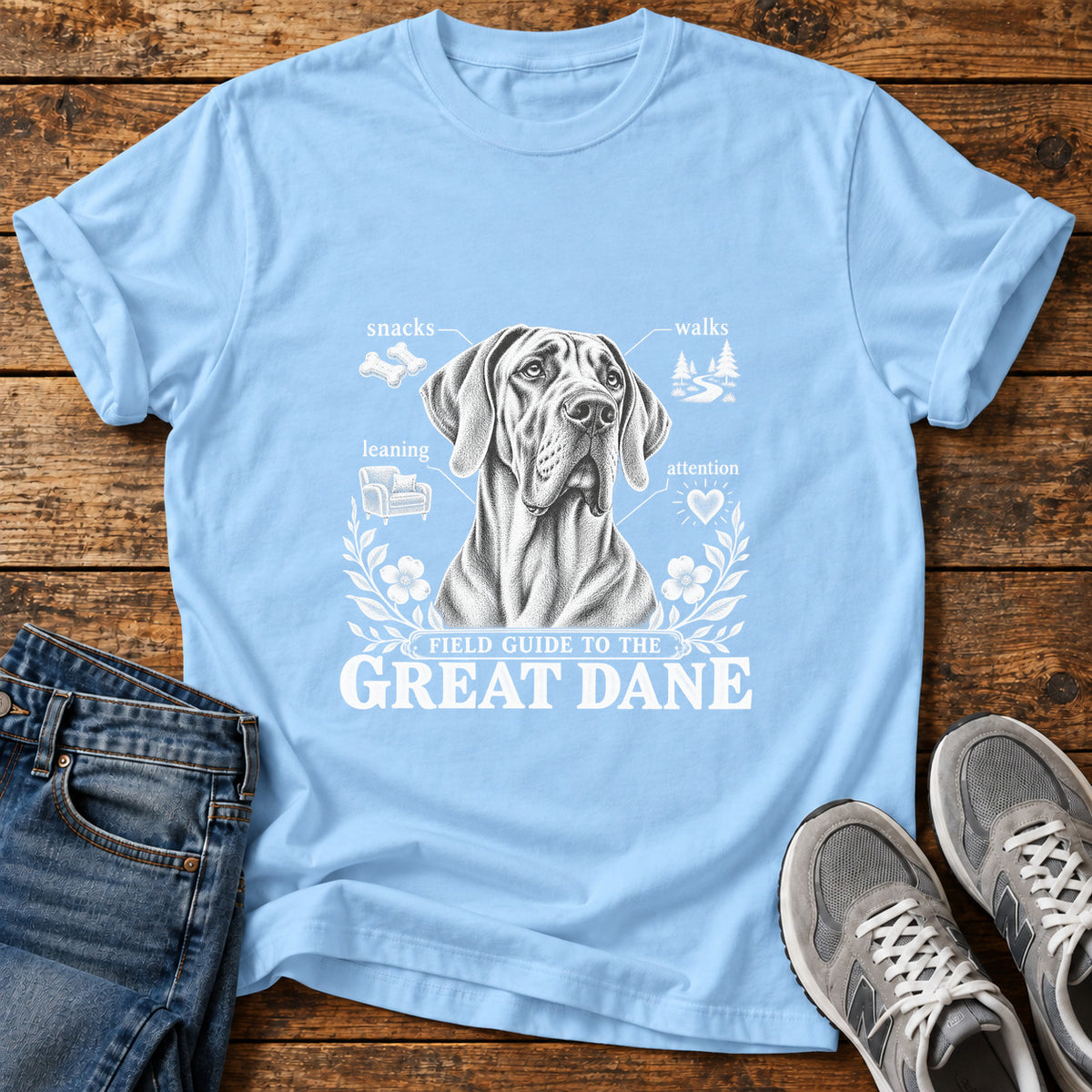 Great Dane Guide graphic T-shirt in Light Blue, shown on a flat-lay shirt mockup